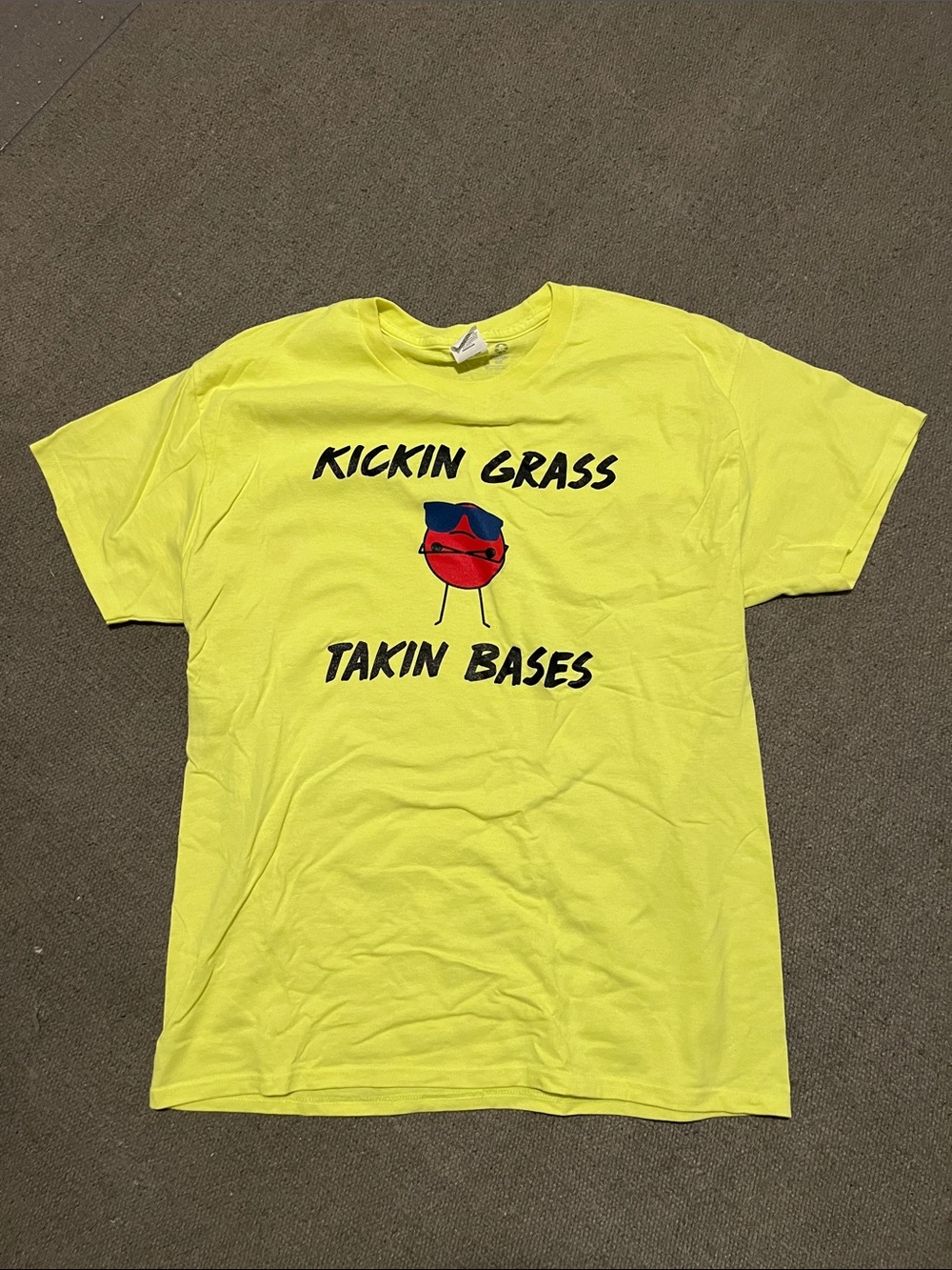 Neon Yellow Graphic Tee "Kickin Grass Takin Bases"